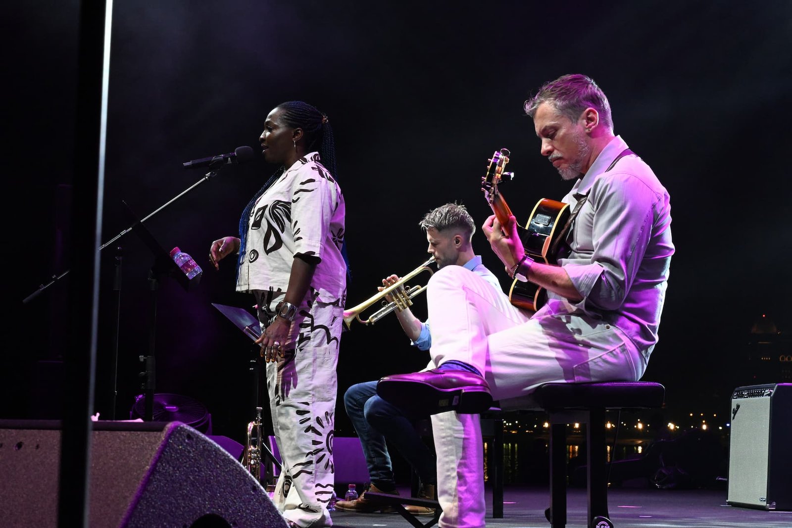 The Ade Inubile Trio featuring Ade, Enrick Adam, and Eoin Grace performing live jazz standards at the Katara Jazz Festival in Doha, Qatar